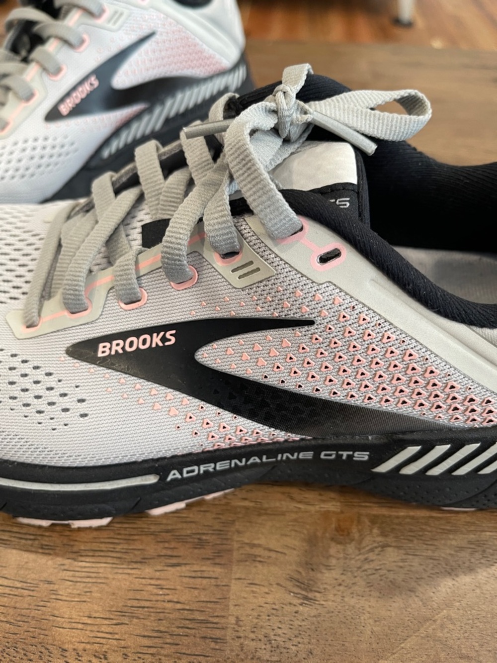 Brooks White Running Shoes with Black and Pink Accents - Picture 2 of 6